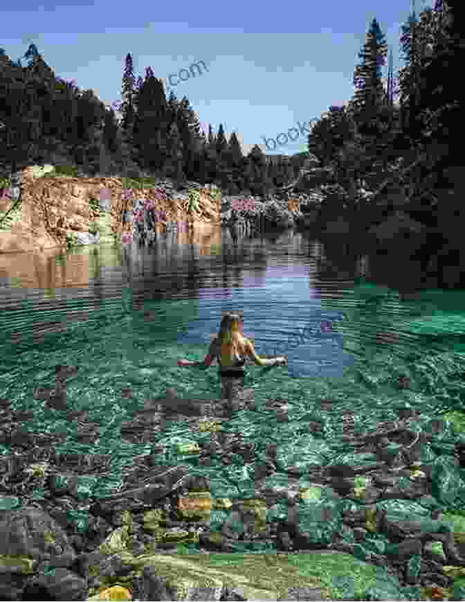 A Hiker Relaxing In The Warm Waters Of The Emerald Pools, Surrounded By Lush Vegetation And Towering Cliffs Hiking Hot Springs In The Pacific Northwest: A Guide To The Area S Best Backcountry Hot Springs (Regional Hiking Series)
