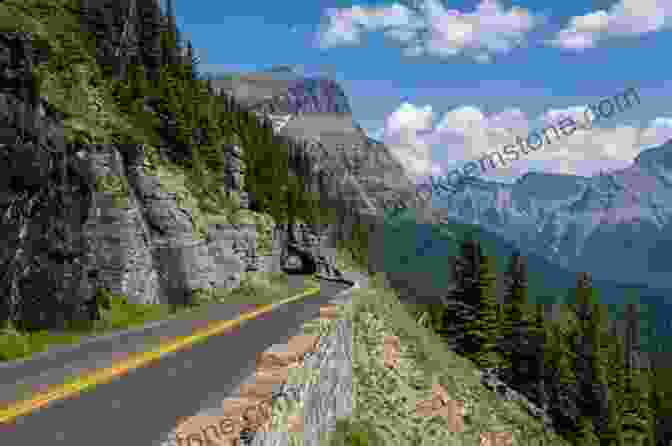 Breathtaking View Of The Going To The Sun Road Winding Its Way Through The Park's Rugged Alpine Terrain, Flanked By Towering Mountains And Sparkling Waterfalls. Mountain Magic Photography: Glacier National Park